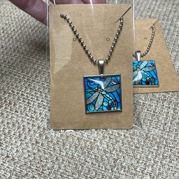 23” ball chain w/ 1” square pendant of blue colored dragonfly.  Clear front NIP - Picture 7 of 7